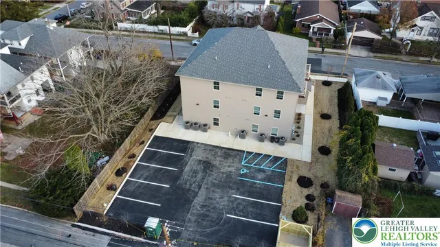 front view of a house with a street