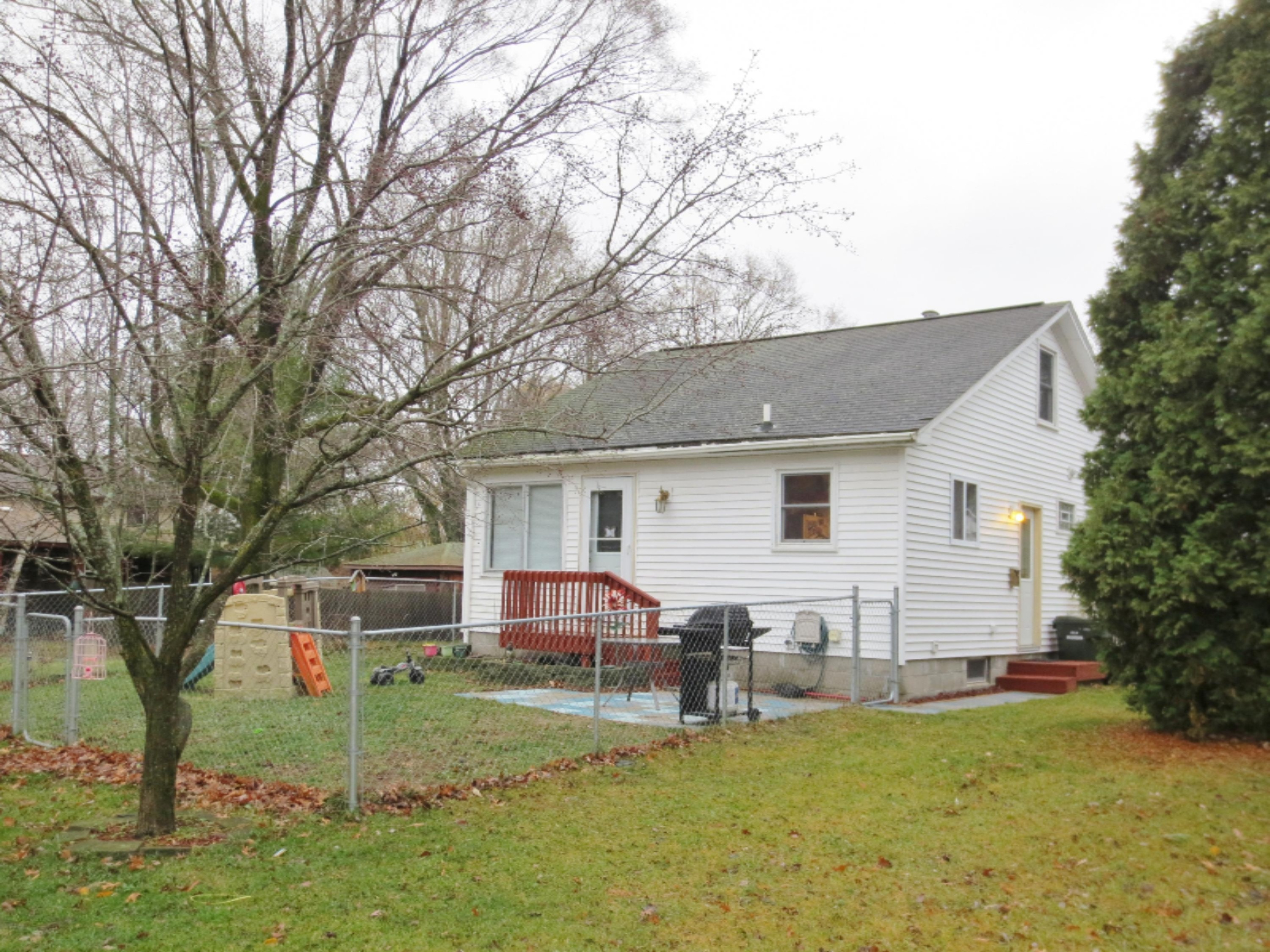 1887 Letart Avenue Muskegon, MI 49441 - Photo 1 of 15 Front Exterior