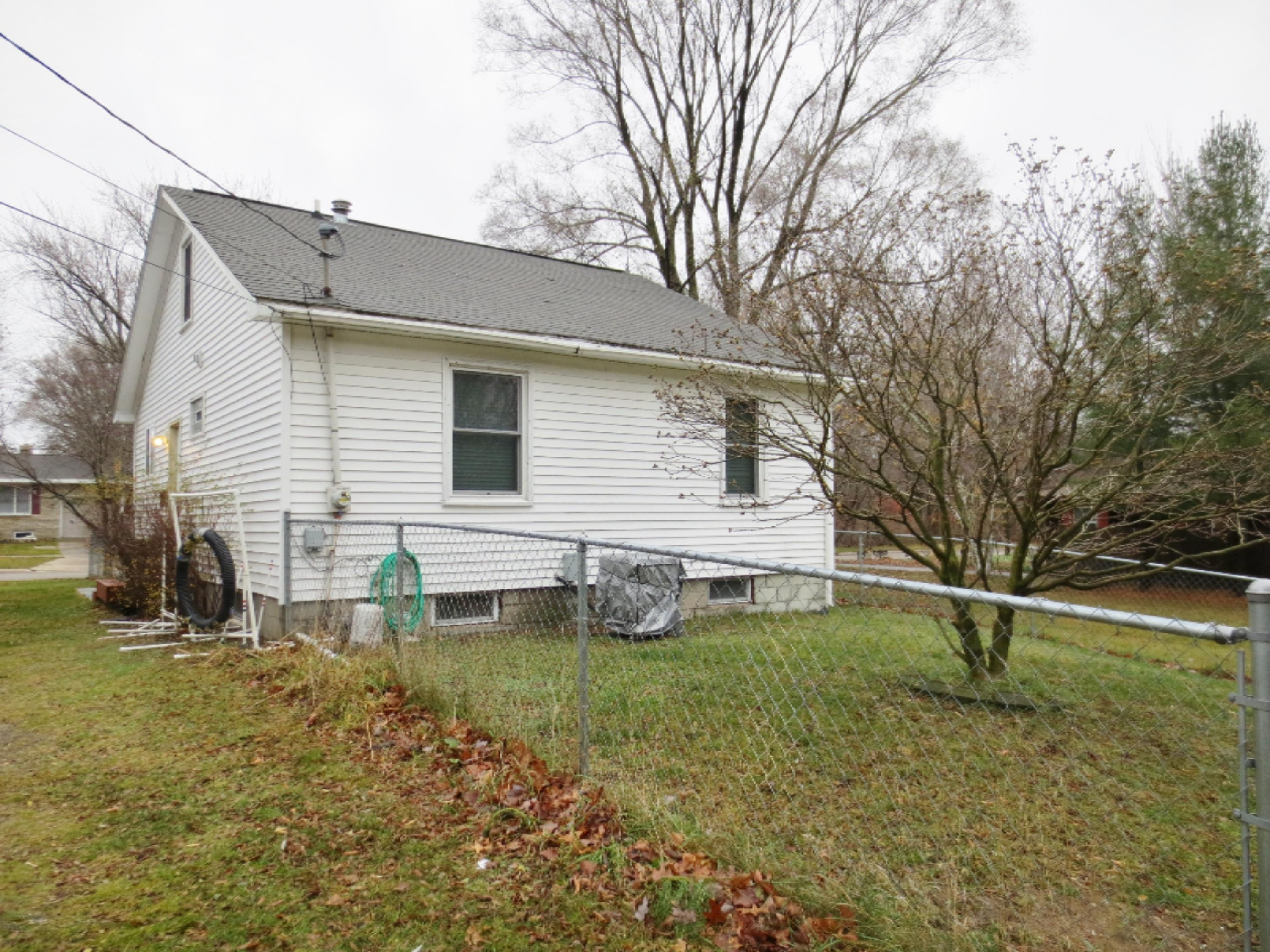 1887 Letart Avenue Muskegon, MI 49441 - Photo 15 of 15 Rear Exterior