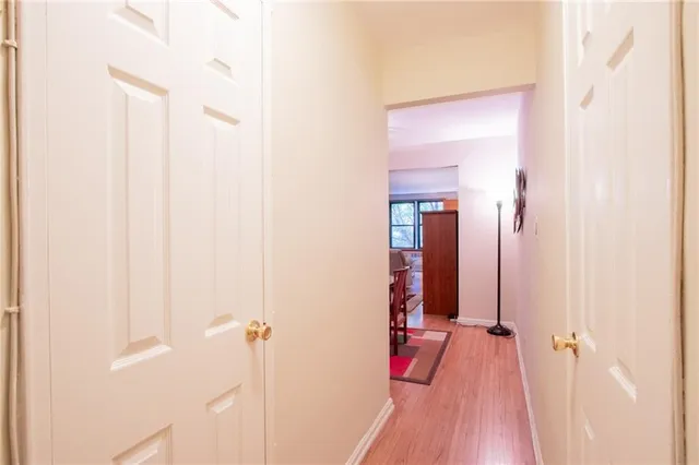 a view of a bedroom from a hallway