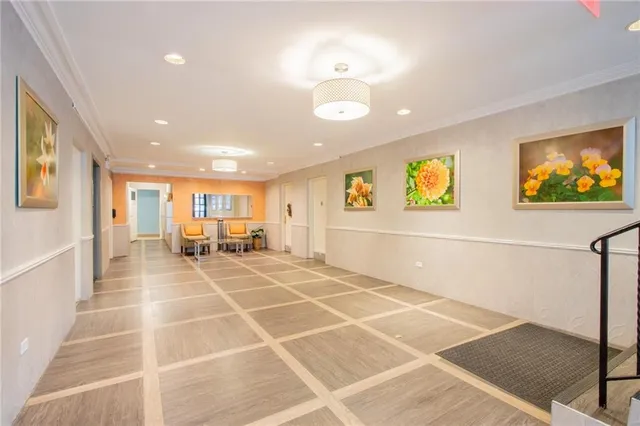 a view of parking garage with cars