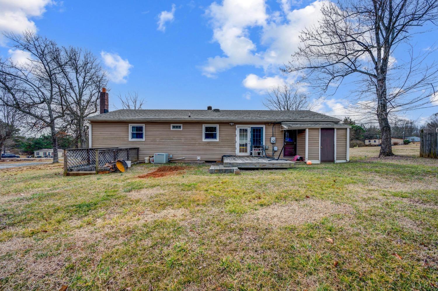 463 Eldon Road Appomattox, VA 24522 - Photo 24 of 32 a front view of house with yard and seating area