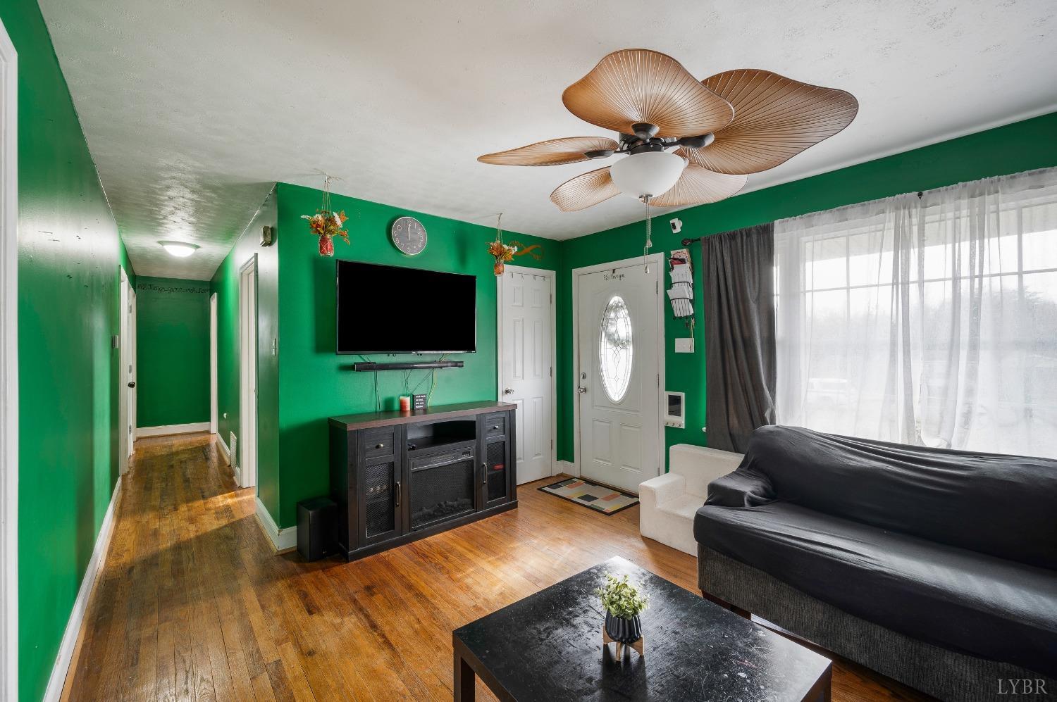 463 Eldon Road Appomattox, VA 24522 - Photo 5 of 32 a living room with furniture and a flat screen tv