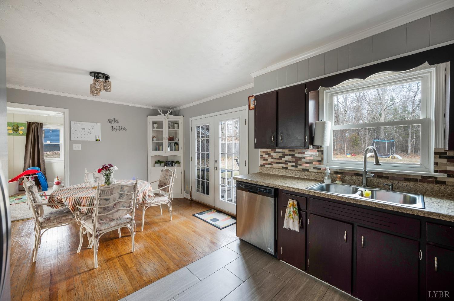 463 Eldon Road Appomattox, VA 24522 - Photo 9 of 32 a kitchen with lots of counter top space and dining table