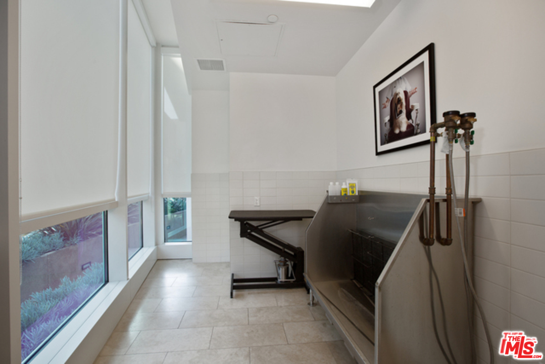 1705 Ocean, Unit 212 Santa Monica, CA 90401 - Photo 12 of 17 a view of a hallway with workspace