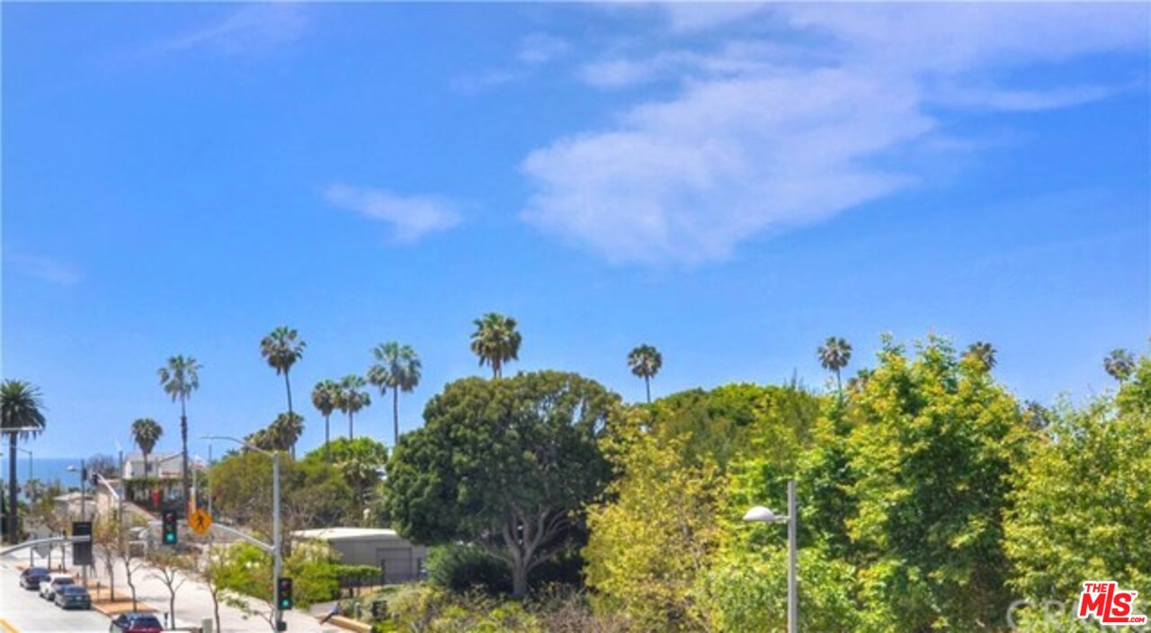 1705 Ocean, Unit 212 Santa Monica, CA 90401 - Photo 10 of 17 a view of a bunch of trees in a background