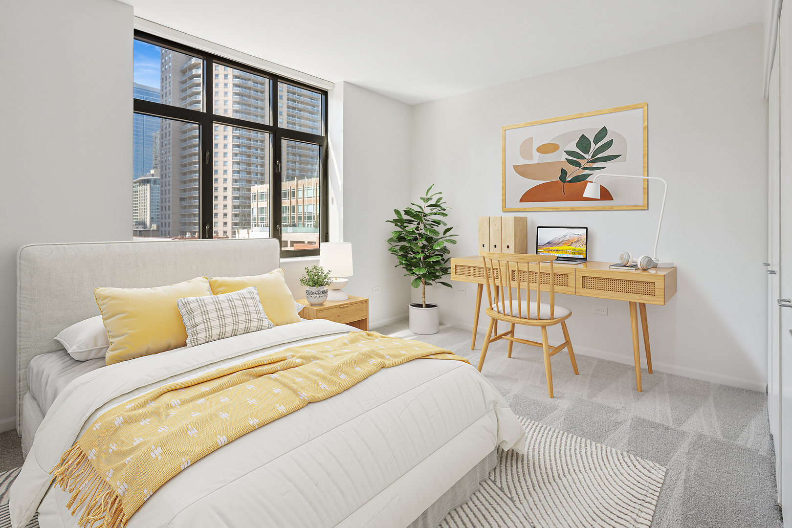 630 North State Street, Unit 1406 Chicago, IL 60654 - Photo 15 of 18 a bedroom with a bed and a table