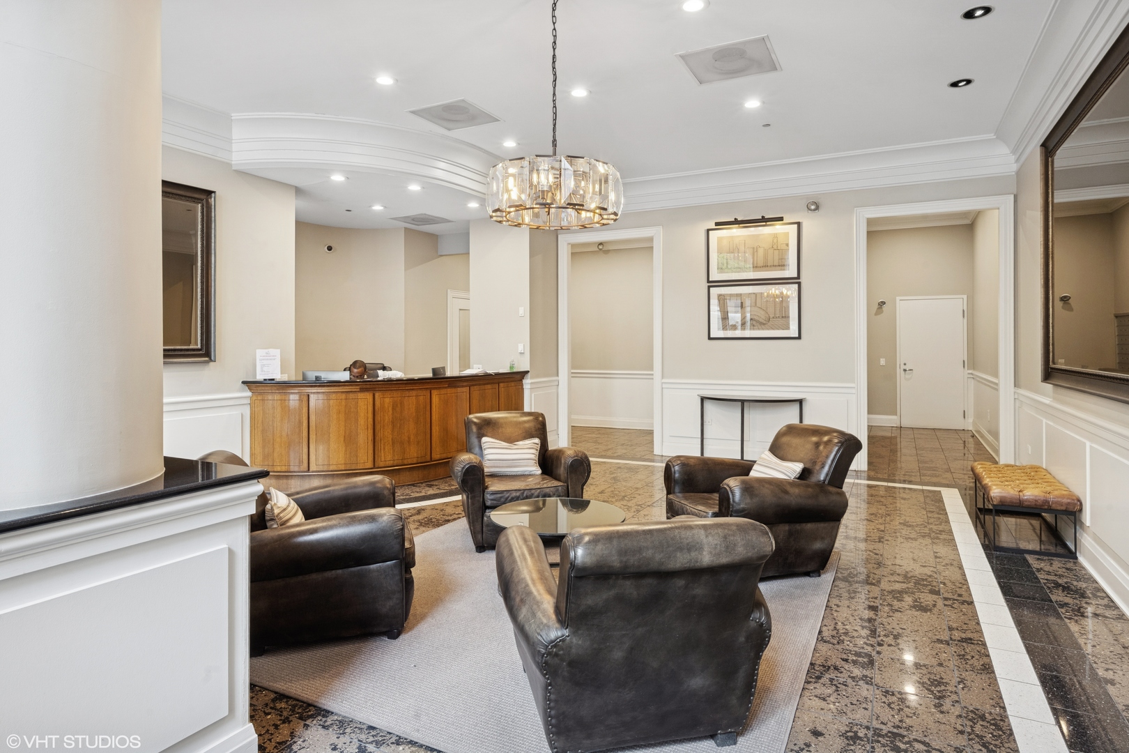 630 North State Street, Unit 1406 Chicago, IL 60654 - Photo 2 of 18 a living room with furniture or chandelier and a fireplace