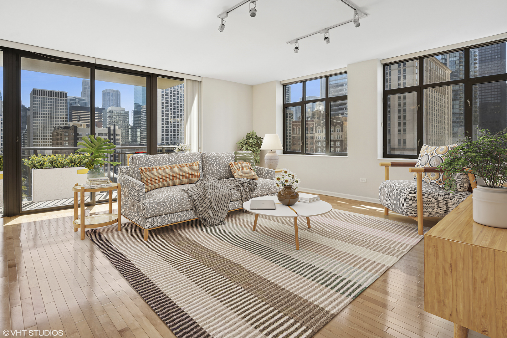 630 North State Street, Unit 1406 Chicago, IL 60654 - Photo 3 of 18 a living room with furniture large windows and wooden floor