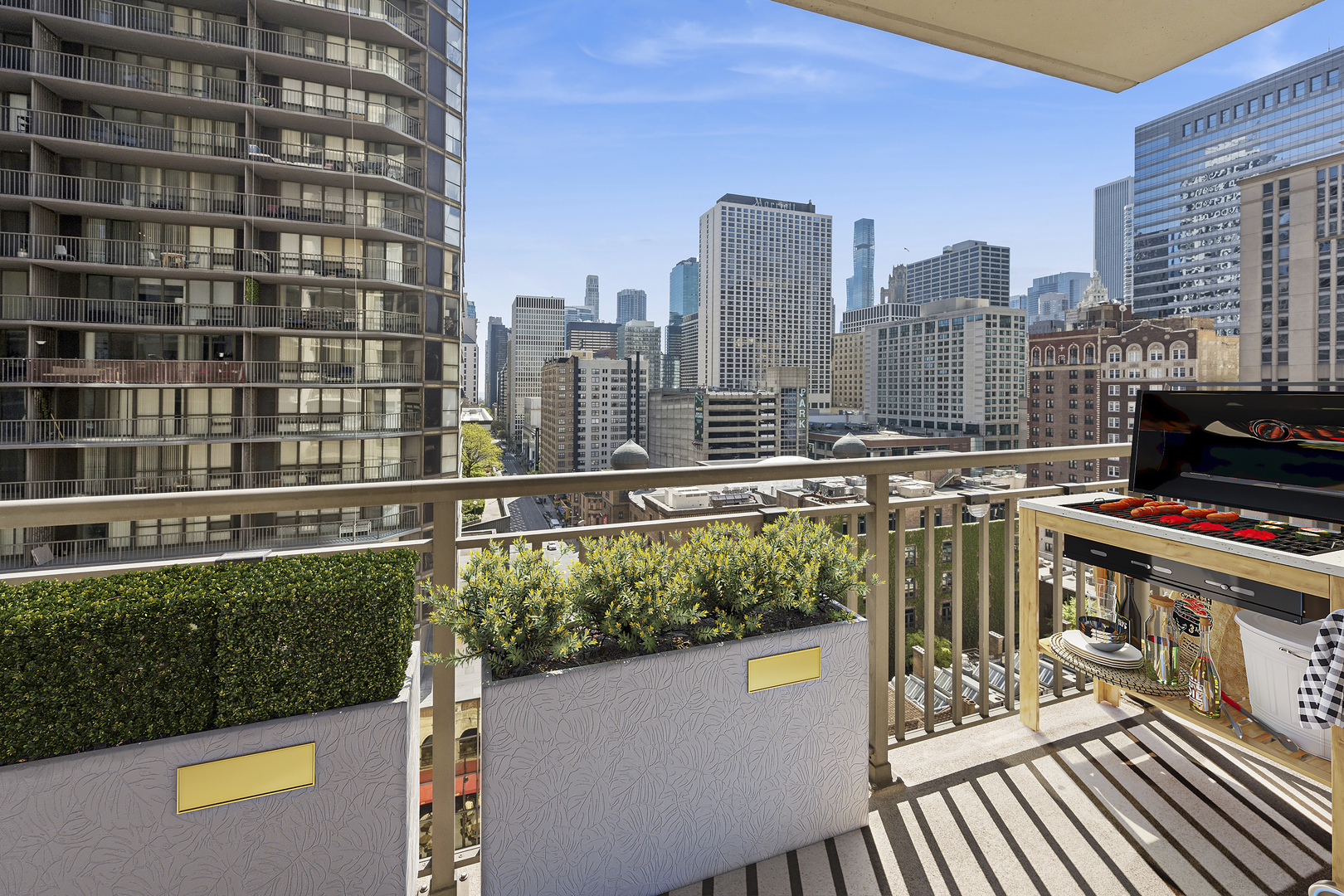 630 North State Street, Unit 1406 Chicago, IL 60654 - Photo 8 of 18 a view of a city with tall buildings