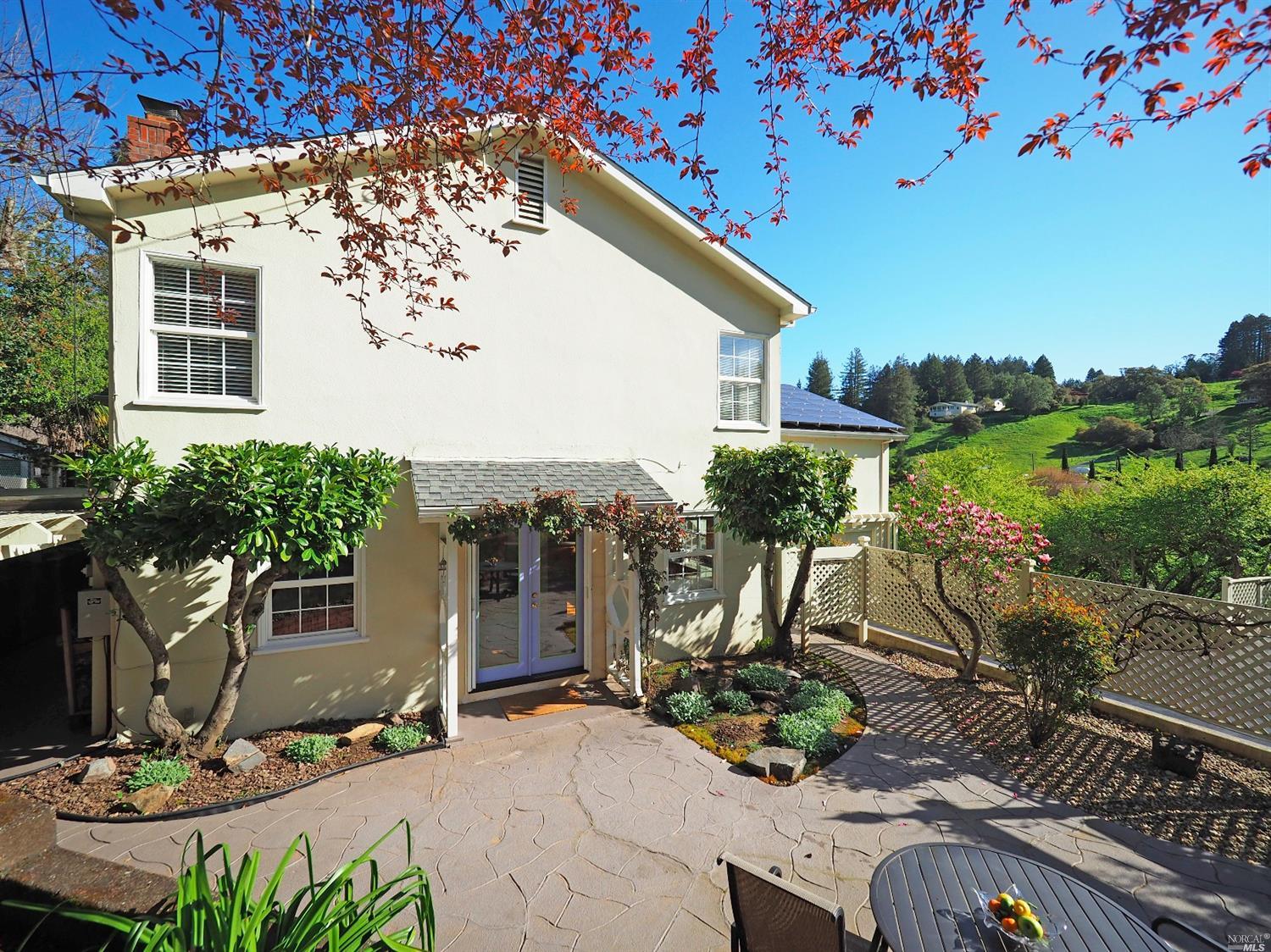 a view of a terrace with sitting area