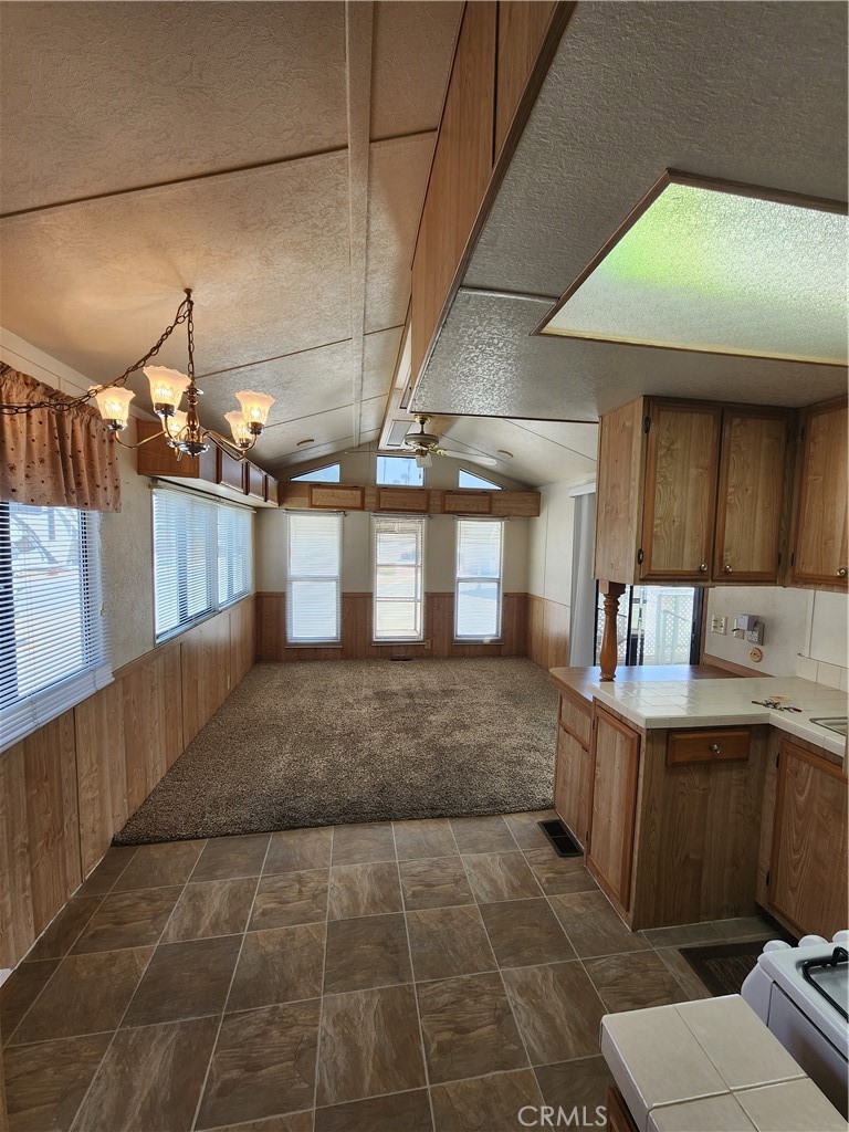 1295 South Cawston Avenue, Unit 267 Hemet, CA 92545 - Photo 8 of 34 Kitchen, dining area, living room