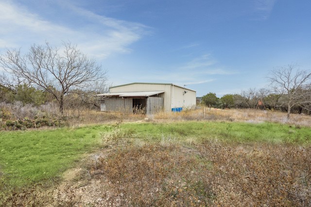 420 Rocky Road Marble Falls, TX 78654 - Photo 4 of 7 View of pole building with a view of rural / pastoral area