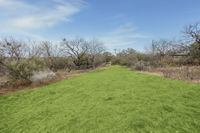 420 Rocky Road Marble Falls, TX 78654 - Photo 7 of 7 View of green lawn featuring a view of rural / pastoral area