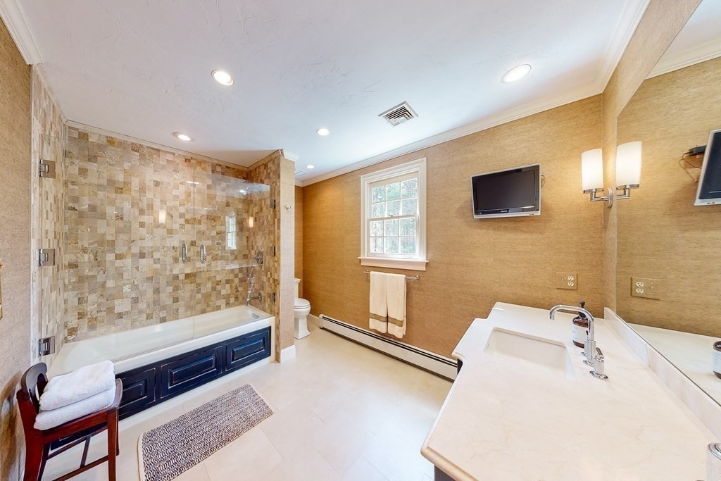 1 Chestnut Lane Medfield, MA 02052 - Photo 20 of 39 a bathroom with a sink and a bathtub