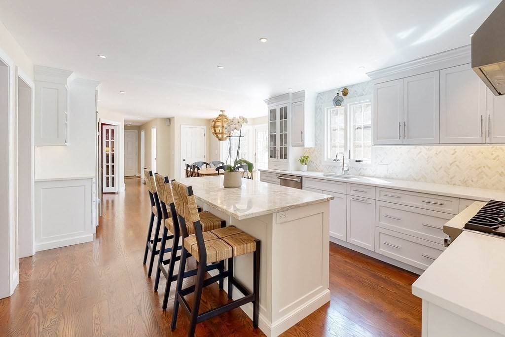 1 Chestnut Lane Medfield, MA 02052 - Photo 3 of 39 a kitchen with granite countertop white cabinets and stainless steel appliances