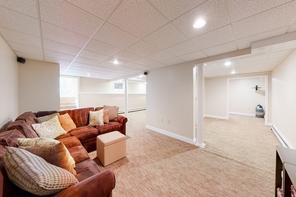 1 Chestnut Lane Medfield, MA 02052 - Photo 32 of 39 a living room with furniture and a couch