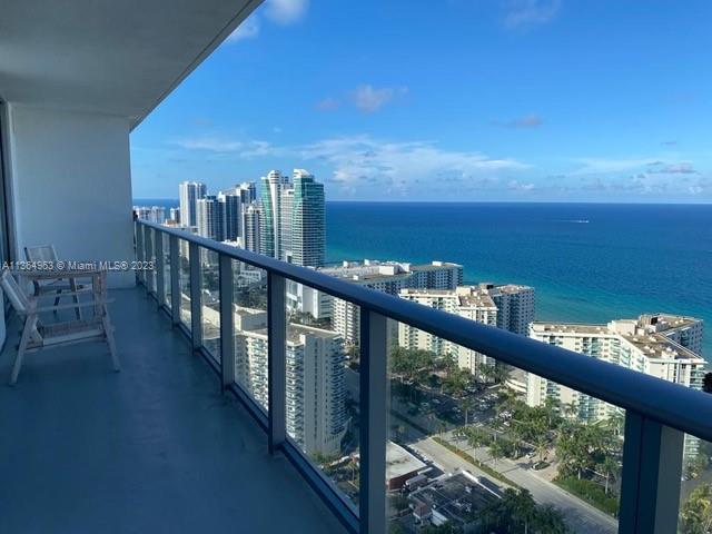 4010 South Ocean Drive, Unit R2305 Hollywood, FL 33019 - Photo 1 of 15 a view of a balcony with an ocean view