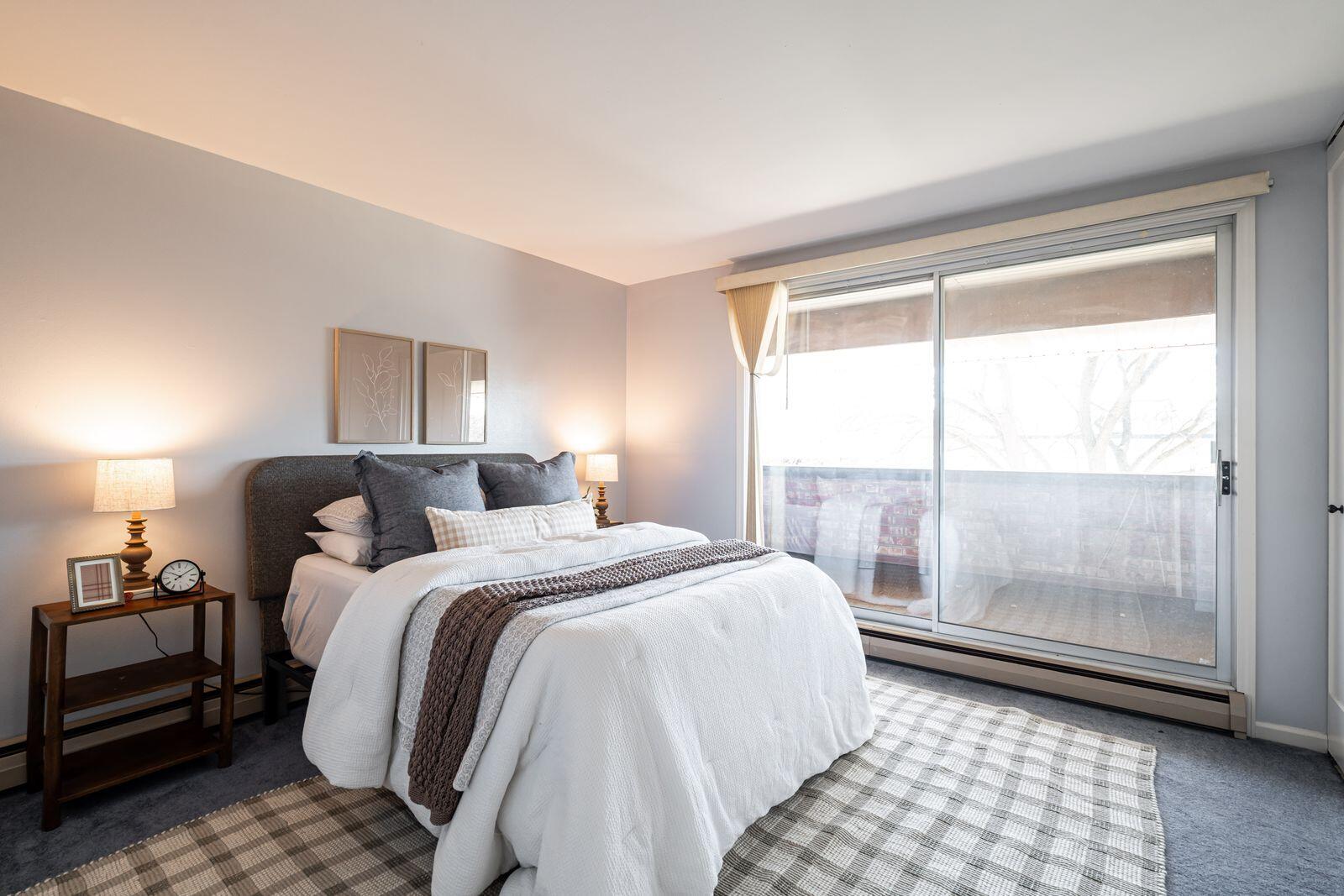 11936 West Mill Road, Unit 9 Milwaukee, WI 53225 - Photo 15 of 36 Bedroom with Private Balcony