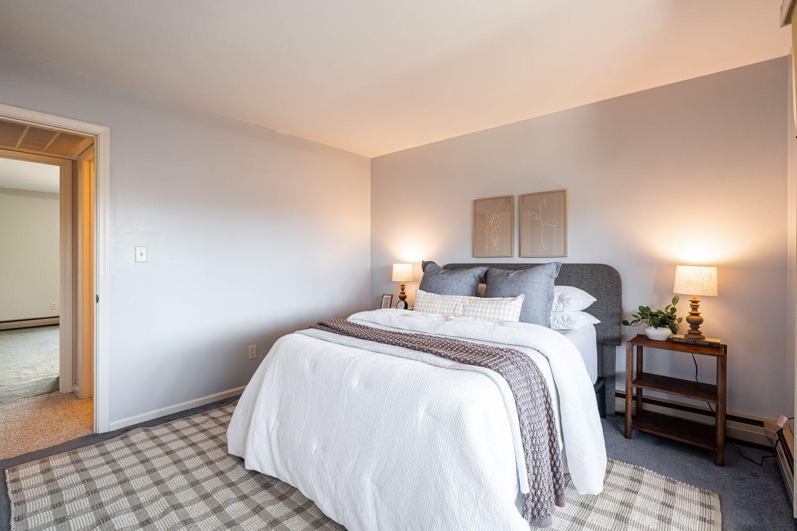 11936 West Mill Road, Unit 9 Milwaukee, WI 53225 - Photo 16 of 36 Spacious Primary Bedroom