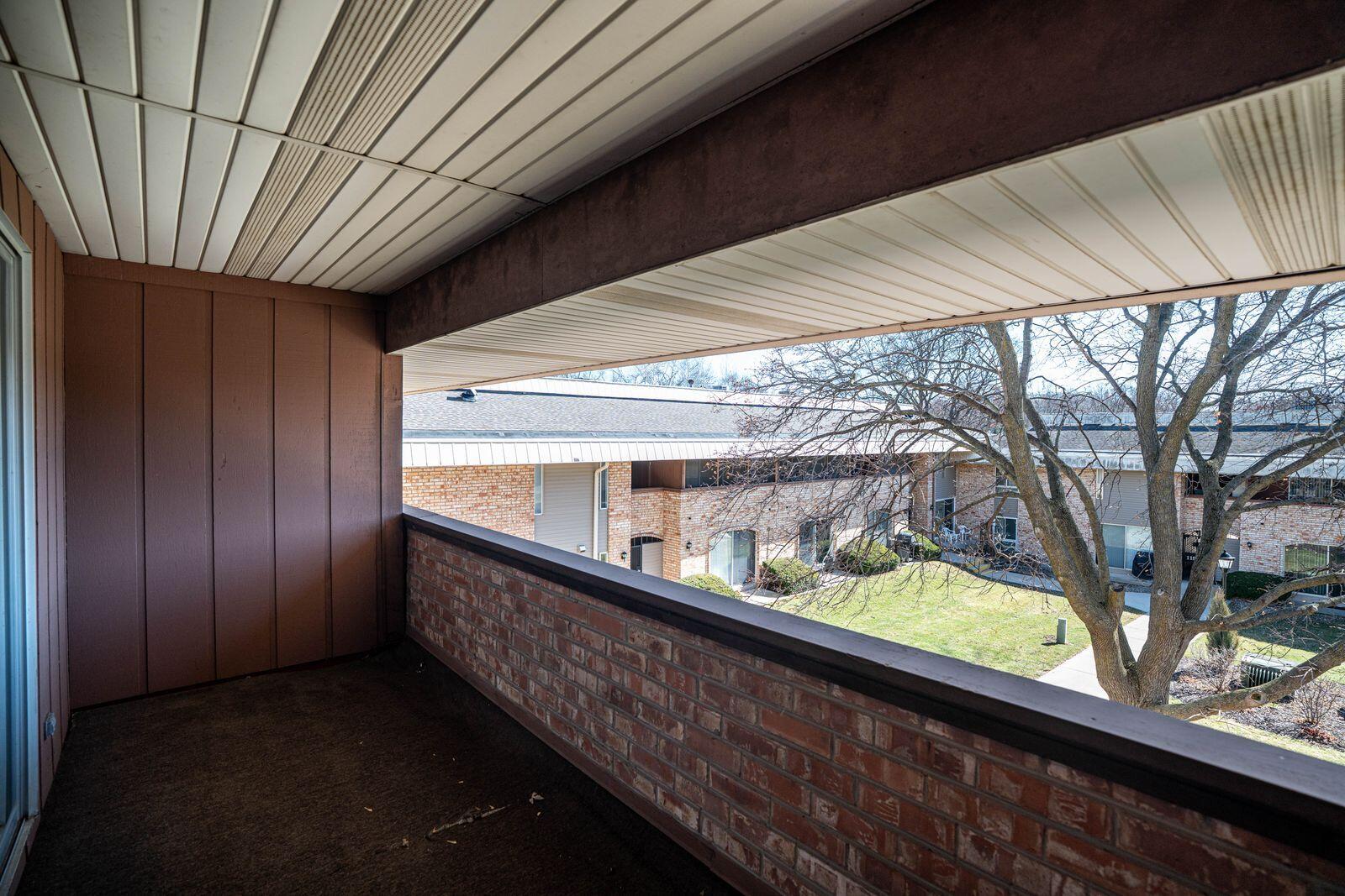 11936 West Mill Road, Unit 9 Milwaukee, WI 53225 - Photo 18 of 36 Primary Bedroom Balcony