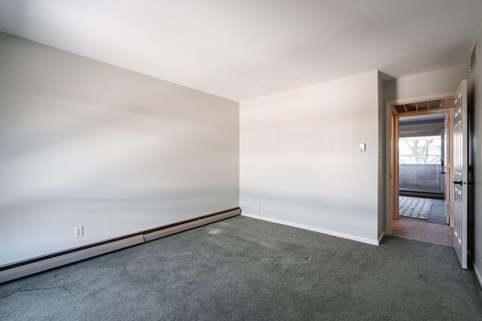 11936 West Mill Road, Unit 9 Milwaukee, WI 53225 - Photo 21 of 36 2nd Upstairs Bedroom
