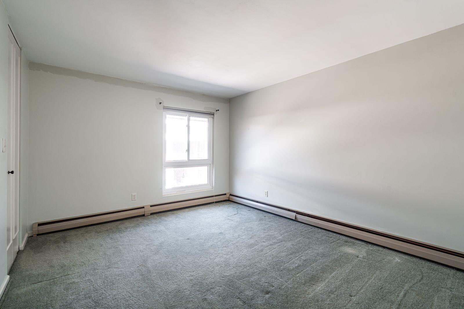 11936 West Mill Road, Unit 9 Milwaukee, WI 53225 - Photo 22 of 36 2nd Upstairs Bedroom