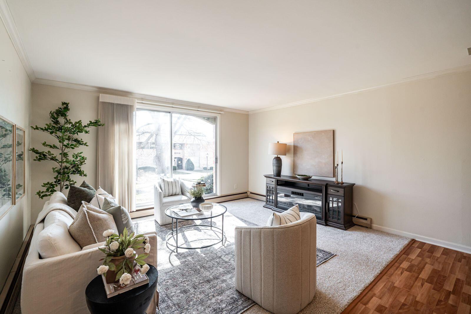 11936 West Mill Road, Unit 9 Milwaukee, WI 53225 - Photo 4 of 36 Living Room to Patio