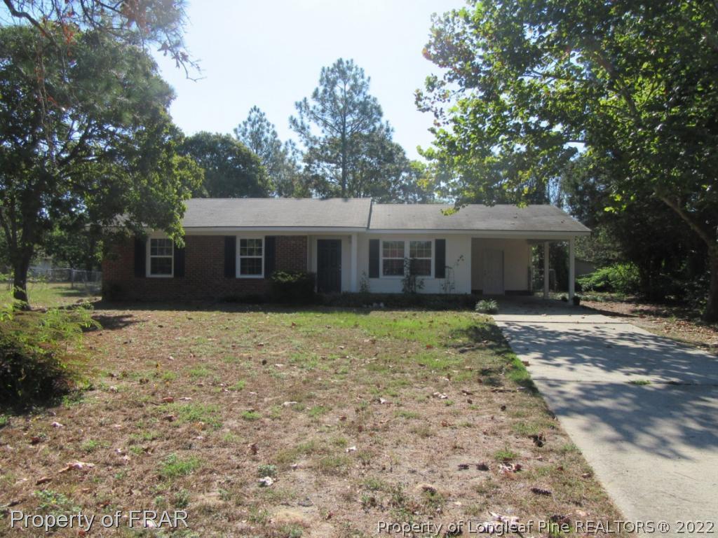 5947 Spinner Road Hope Mills, NC 28348 - Photo 1 of 31 a view of a house with a yard