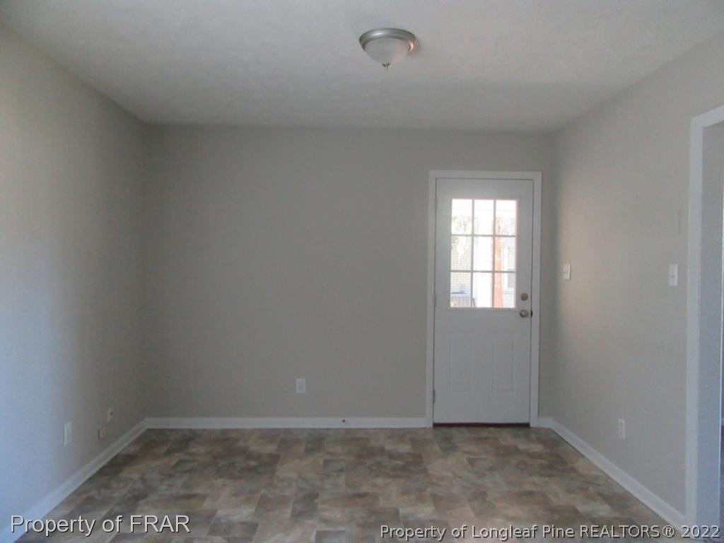 5947 Spinner Road Hope Mills, NC 28348 - Photo 15 of 31 an empty room with a window