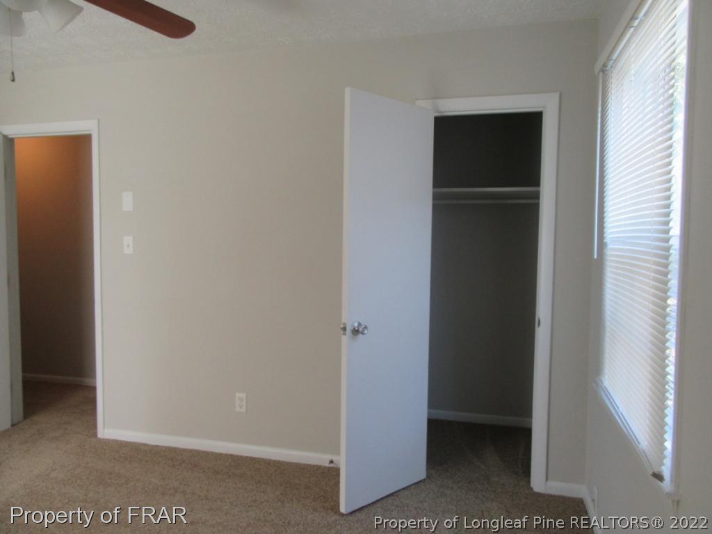 5947 Spinner Road Hope Mills, NC 28348 - Photo 23 of 31 a view of walk in closet