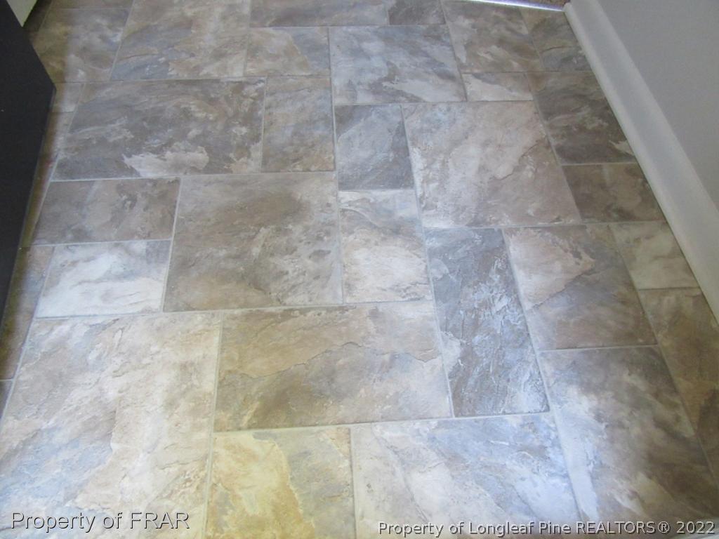 5947 Spinner Road Hope Mills, NC 28348 - Photo 10 of 31 a bathroom with a shower