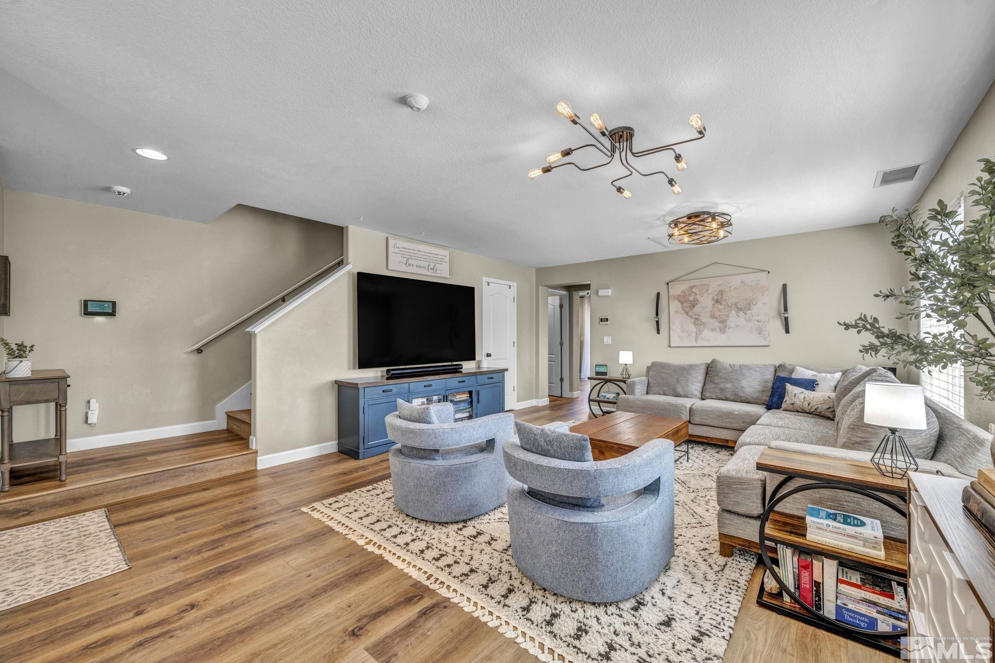 485 Sondrio Court Reno, NV 89521 - Photo 1 of 40 a living room with furniture and a flat screen tv
