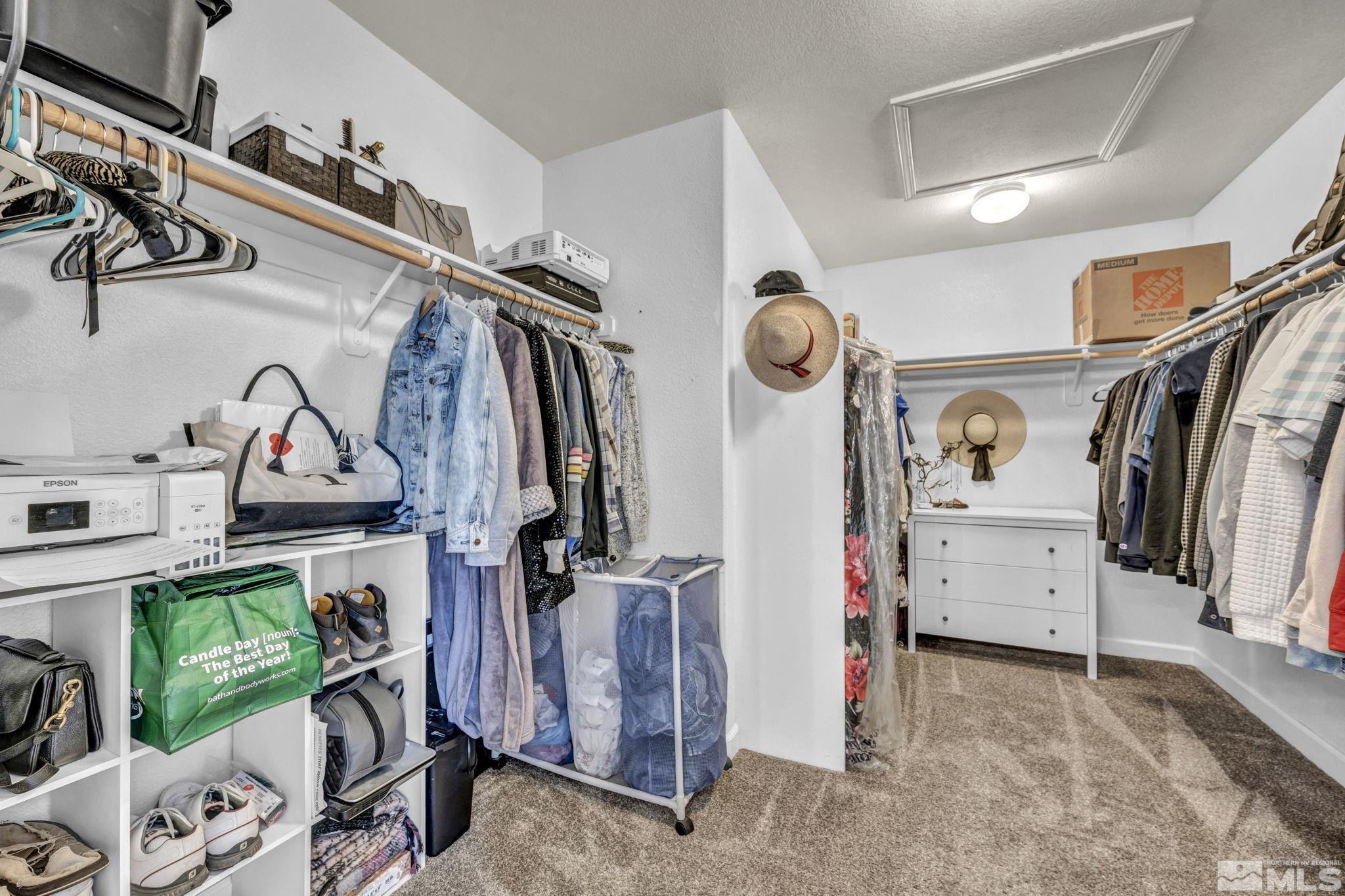 485 Sondrio Court Reno, NV 89521 - Photo 22 of 40 a view of walk in closet with clothes and shoes
