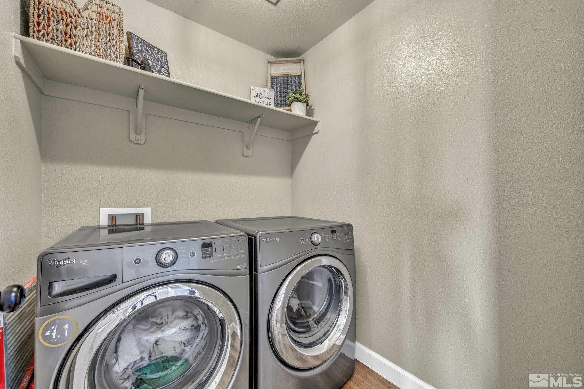 485 Sondrio Court Reno, NV 89521 - Photo 28 of 40 a utility room with dryer and washer