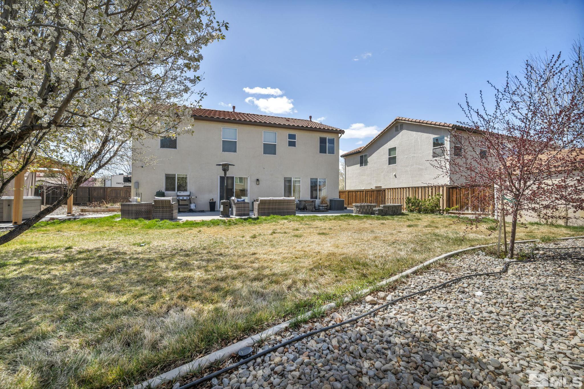 485 Sondrio Court Reno, NV 89521 - Photo 30 of 40 a house view with a swimming pool