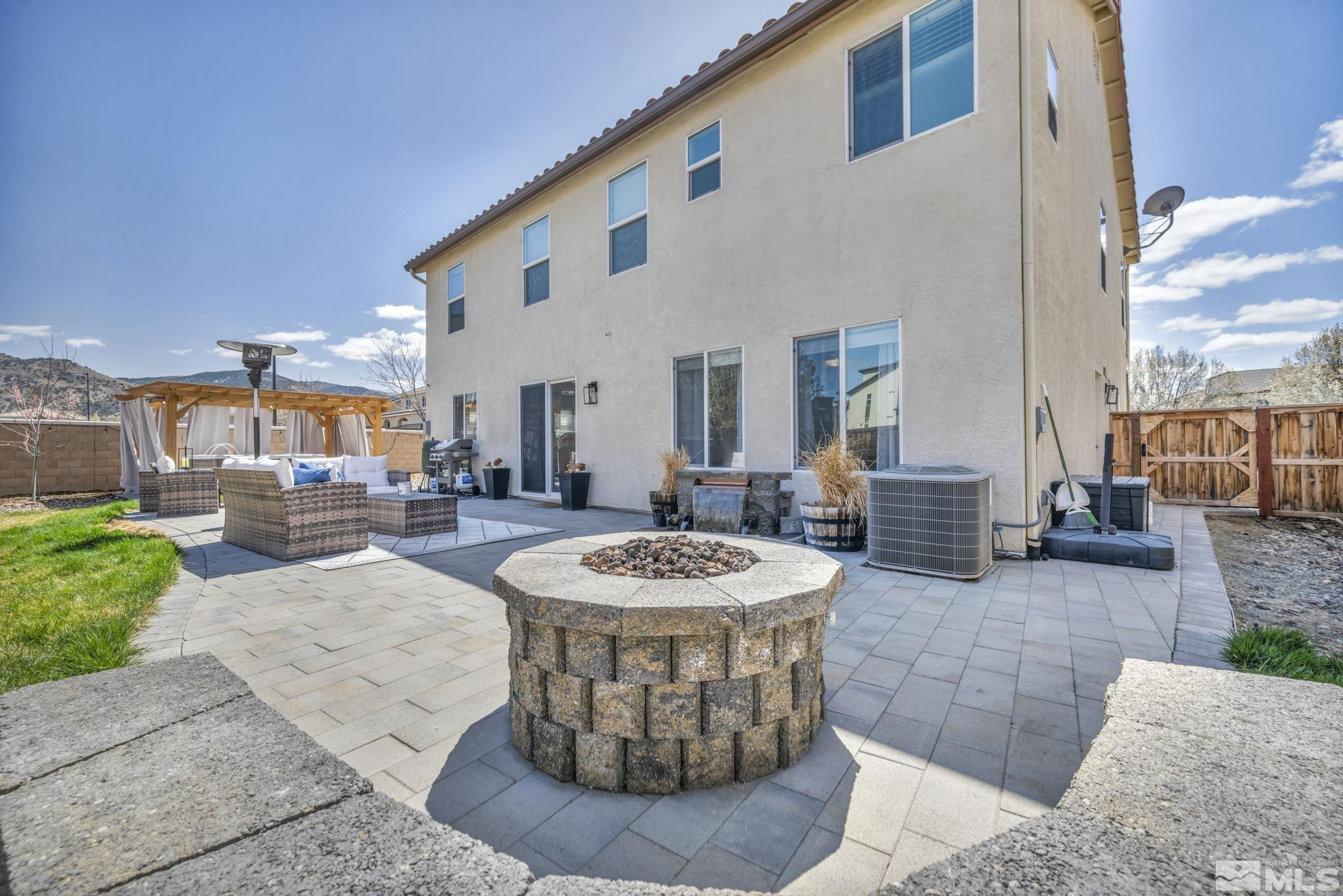 485 Sondrio Court Reno, NV 89521 - Photo 32 of 40 a view of a living room and kitchen