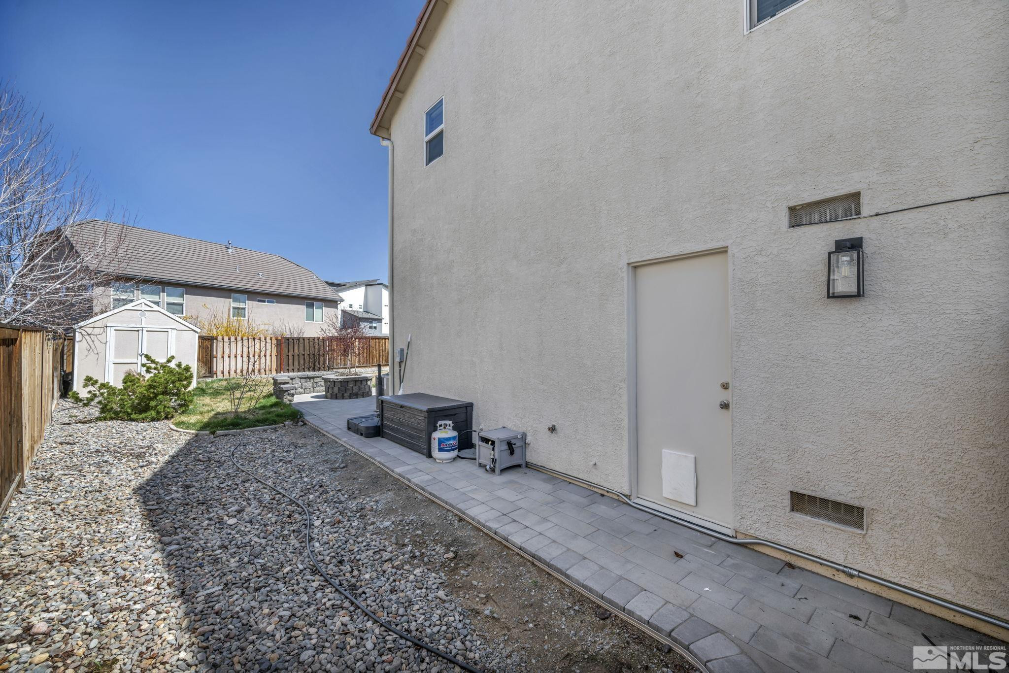 485 Sondrio Court Reno, NV 89521 - Photo 34 of 40 a view of a backyard with sitting area