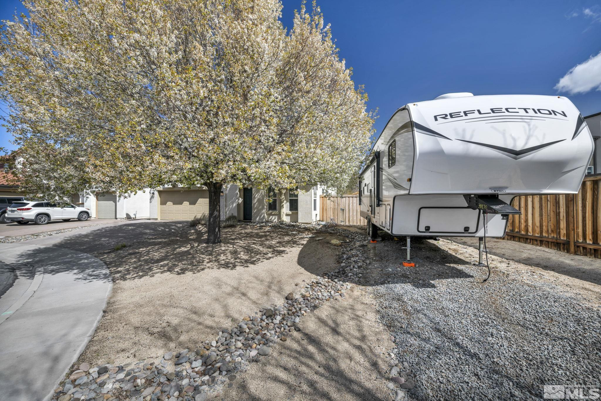 485 Sondrio Court Reno, NV 89521 - Photo 5 of 40 a view of a park with bench and a tree