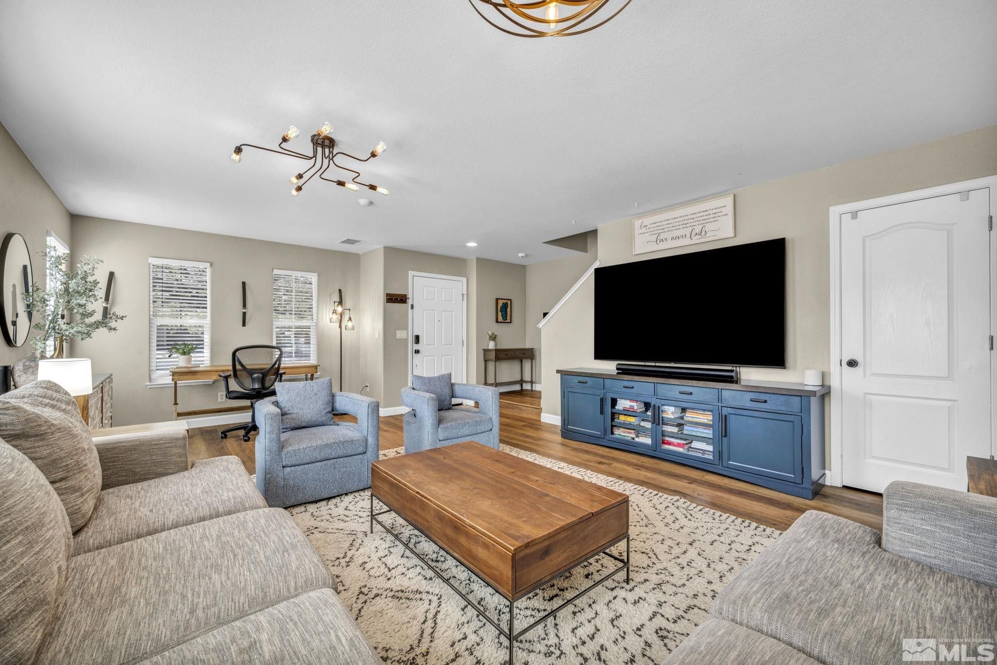 485 Sondrio Court Reno, NV 89521 - Photo 7 of 40 a living room with furniture and a flat screen tv