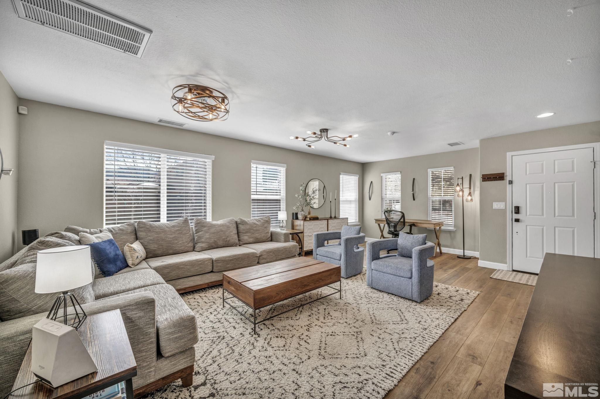 485 Sondrio Court Reno, NV 89521 - Photo 8 of 40 a living room with furniture and a window