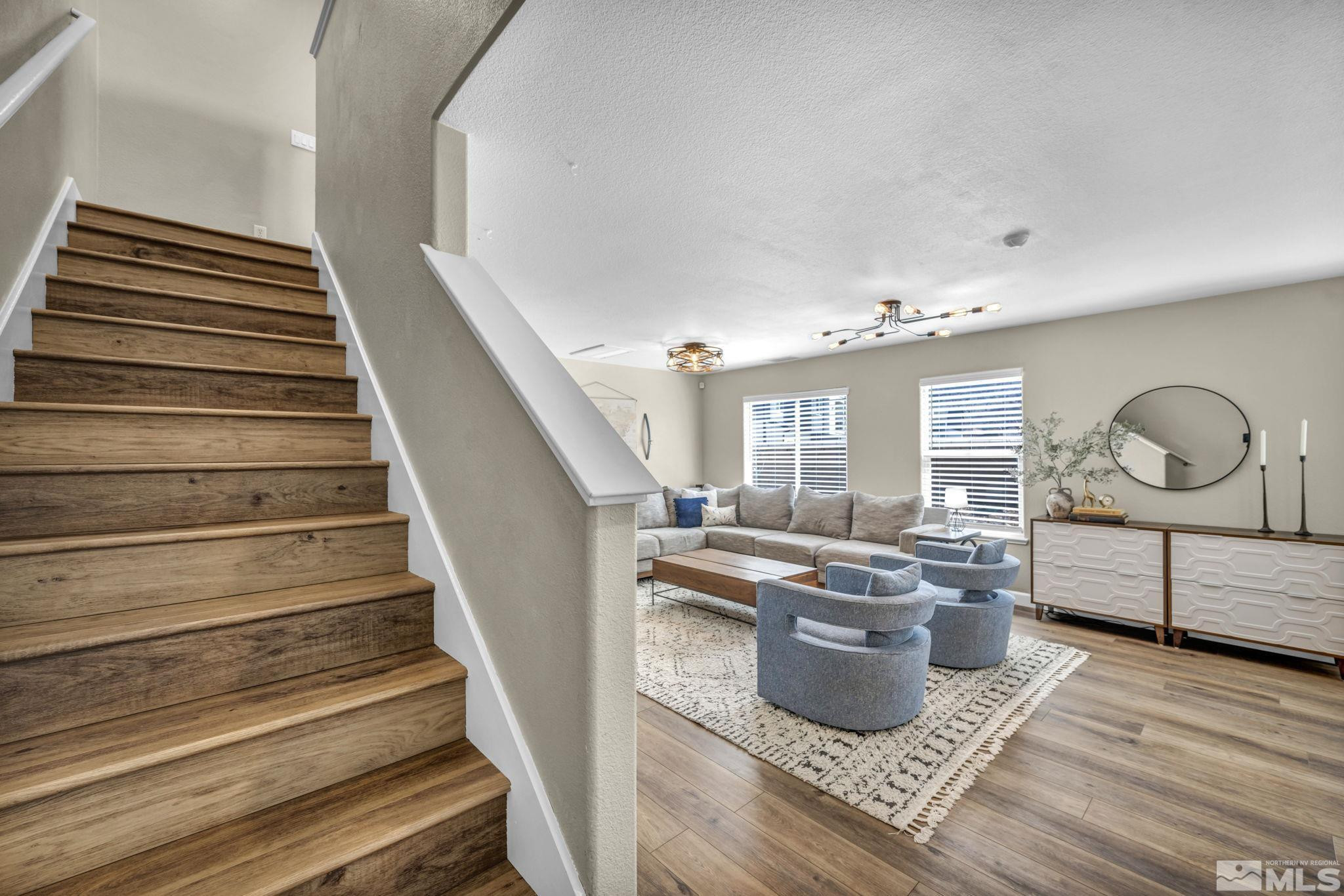 485 Sondrio Court Reno, NV 89521 - Photo 9 of 40 a living room with furniture and wooden floor