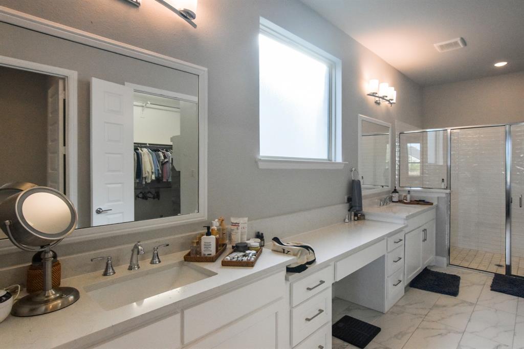 2516 Maidenhair Road Frisco, TX 75033 - Photo 12 of 30 a bathroom with a double vanity sink mirror and double