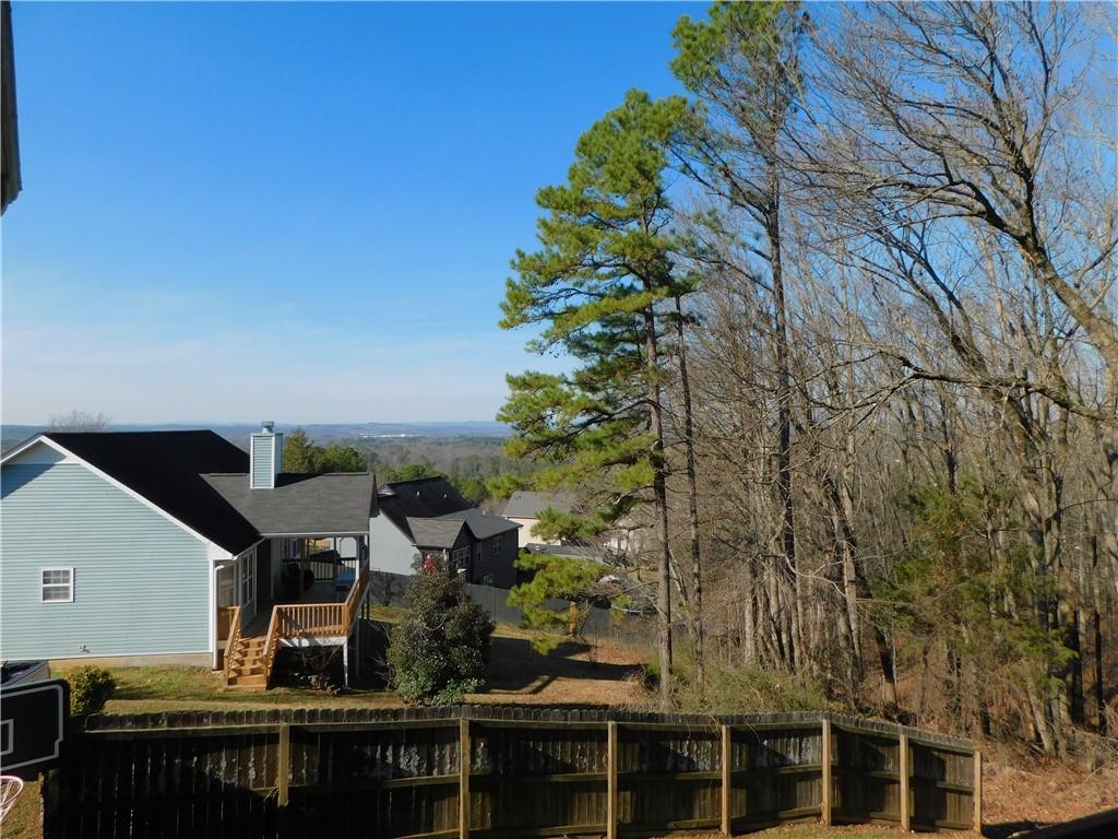 419 Rail Overlook Adairsville, GA 30103 - Photo 15 of 17 a view of a balcony with chairs