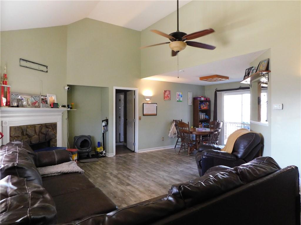 419 Rail Overlook Adairsville, GA 30103 - Photo 2 of 17 a living room with furniture and a wooden floor
