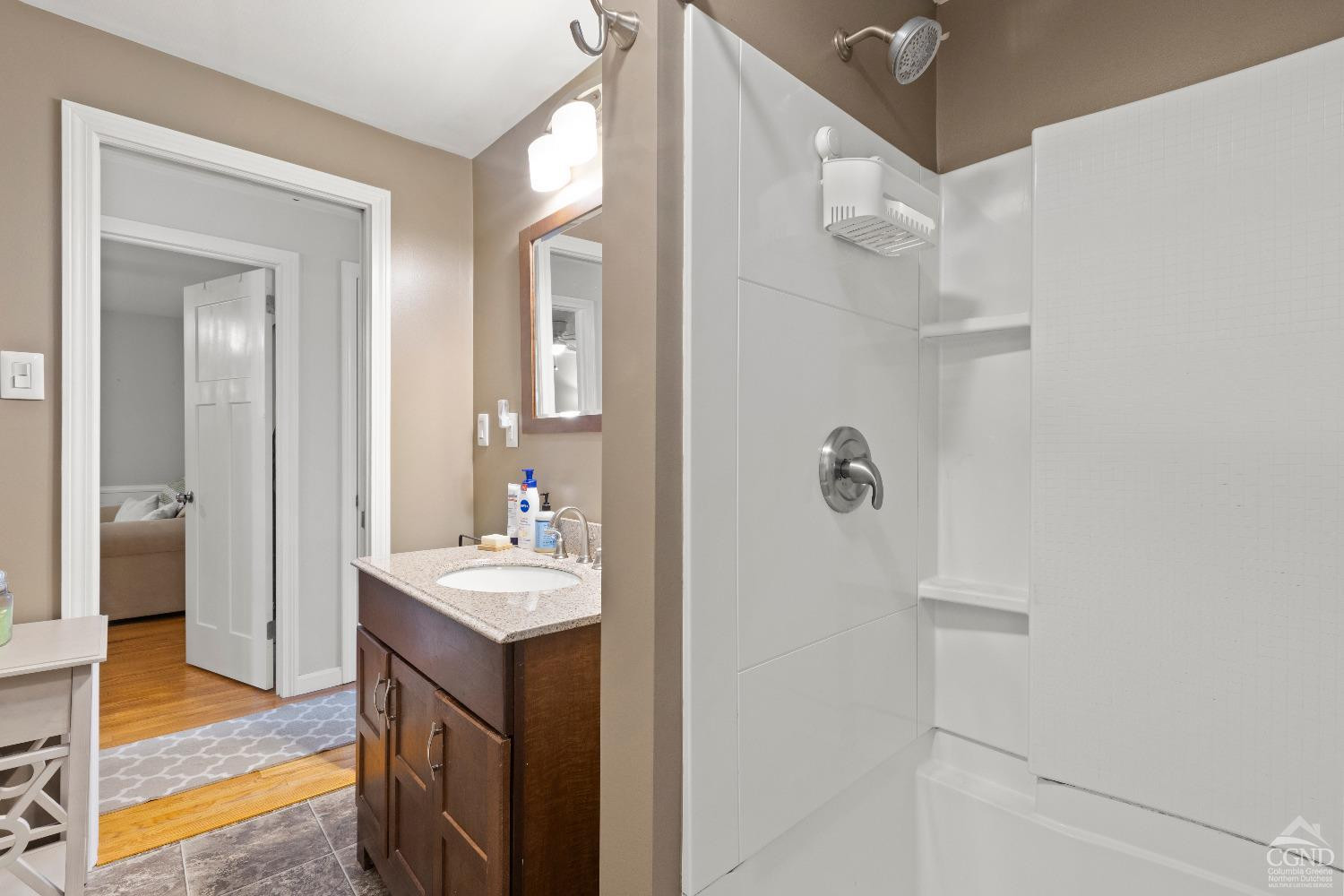 7 Red Apple Lane Catskill, NY 12414 - Photo 14 of 32 a bathroom with a sink vanity and a mirror