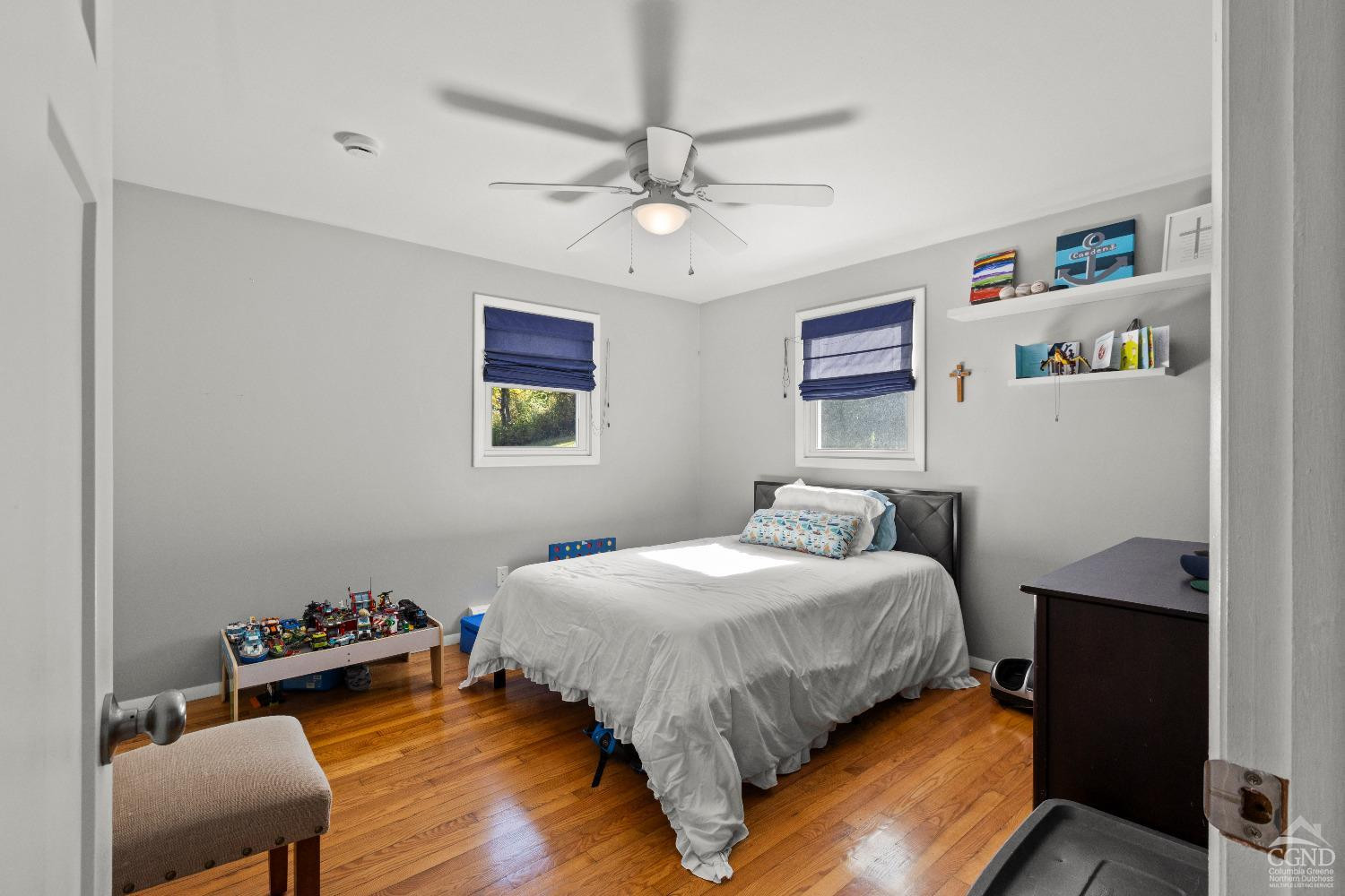 7 Red Apple Lane Catskill, NY 12414 - Photo 17 of 32 a bedroom with a bed and a desk