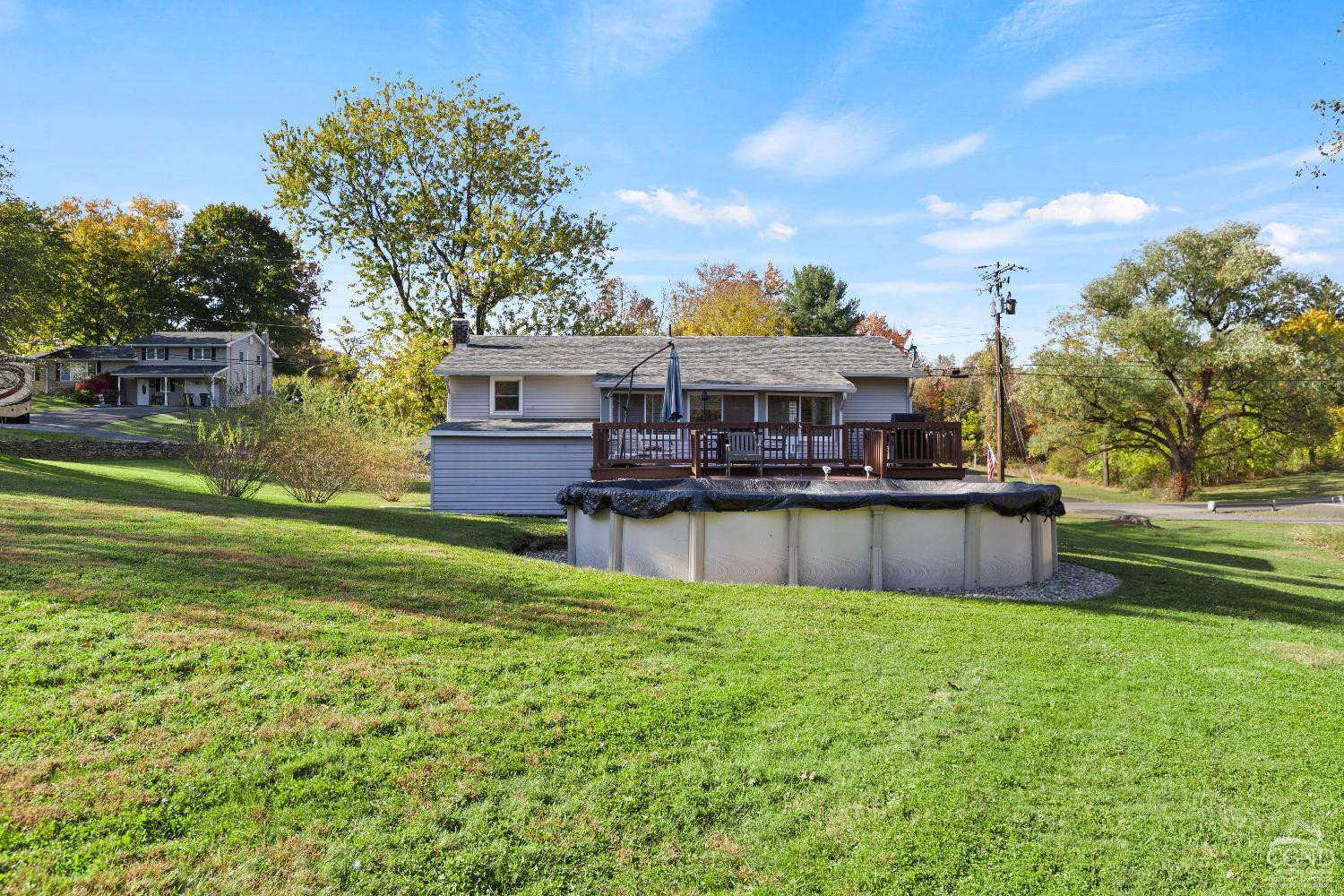 7 Red Apple Lane Catskill, NY 12414 - Photo 22 of 32 a swimming pool with outdoor seating and yard
