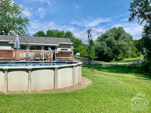 7 Red Apple Lane Catskill, NY 12414 - Photo 29 of 32 a front view of house with yard and outdoor seating