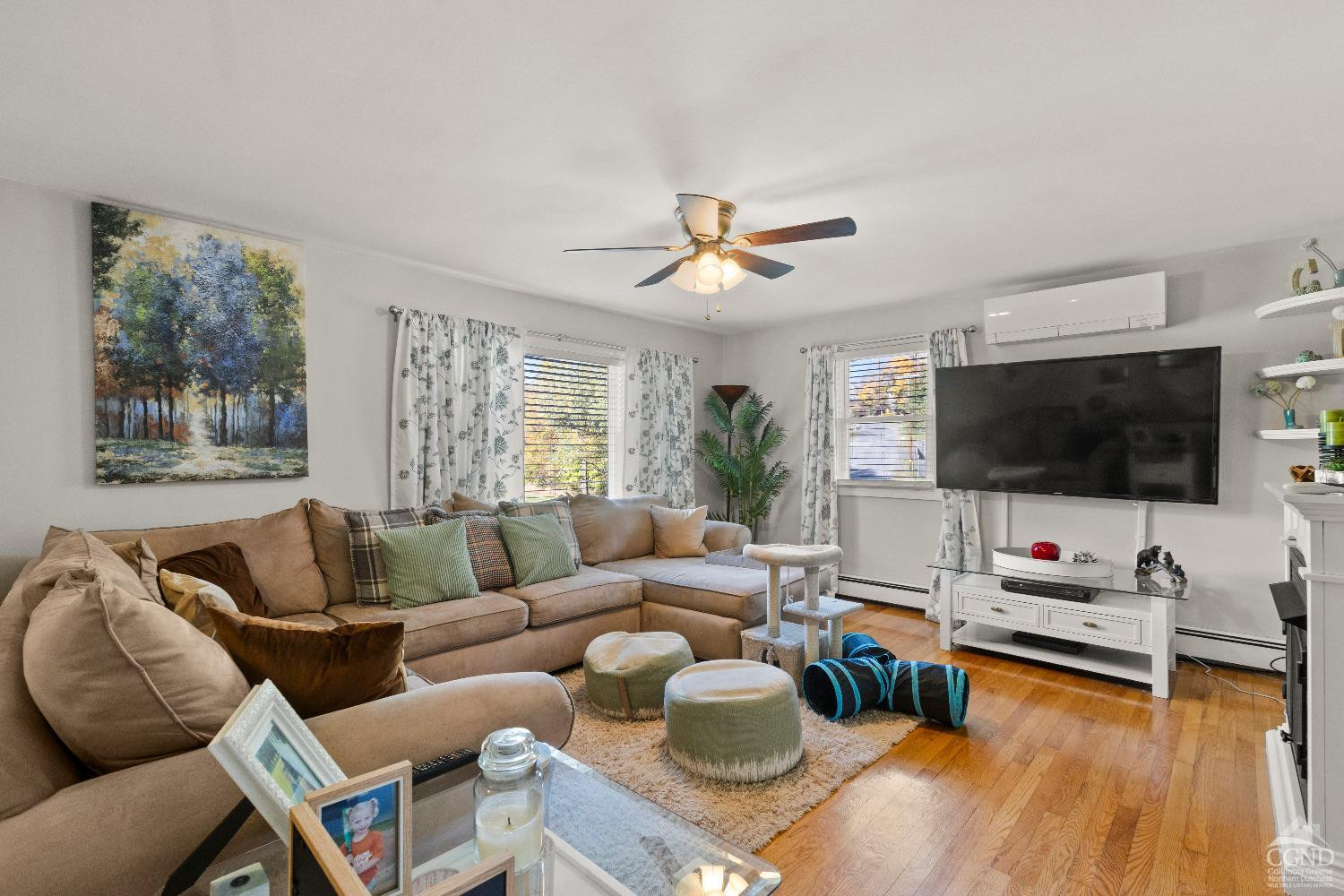 7 Red Apple Lane Catskill, NY 12414 - Photo 5 of 32 a living room with furniture and a flat screen tv